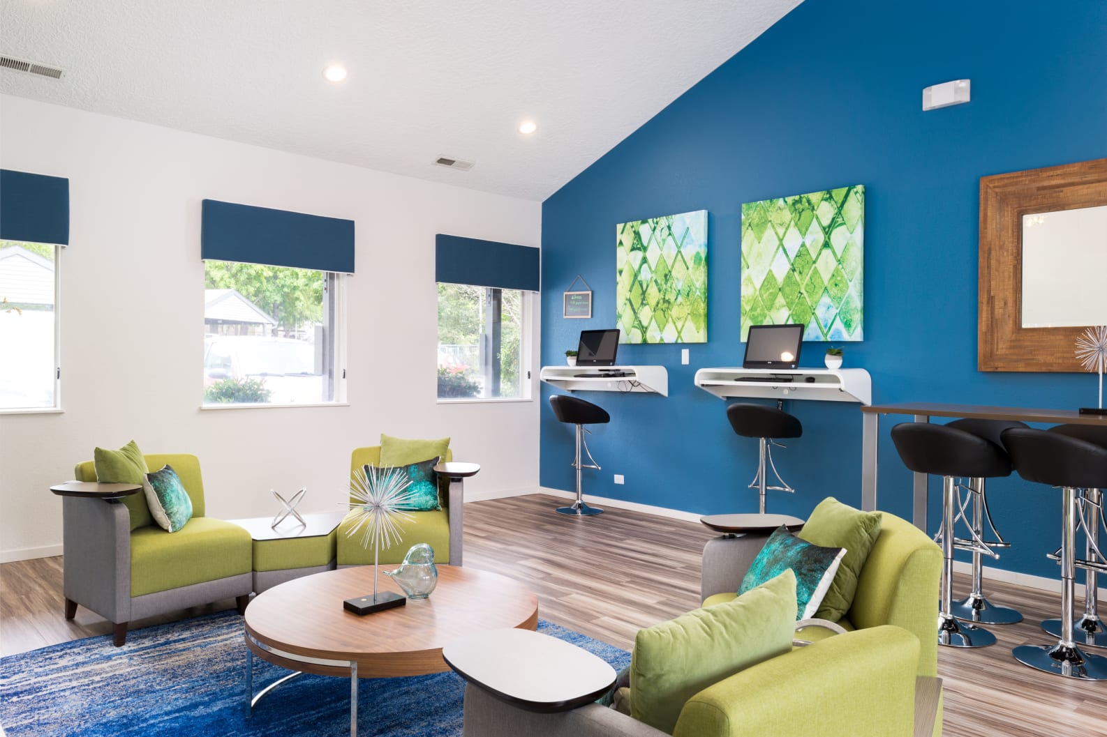 Clubhouse lounge with computer stations at Meadows at Cascade Park apartments for rent in Clark County, WA